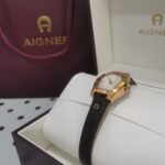 ساعة اقنر نسائية جلد اصليه لون بني